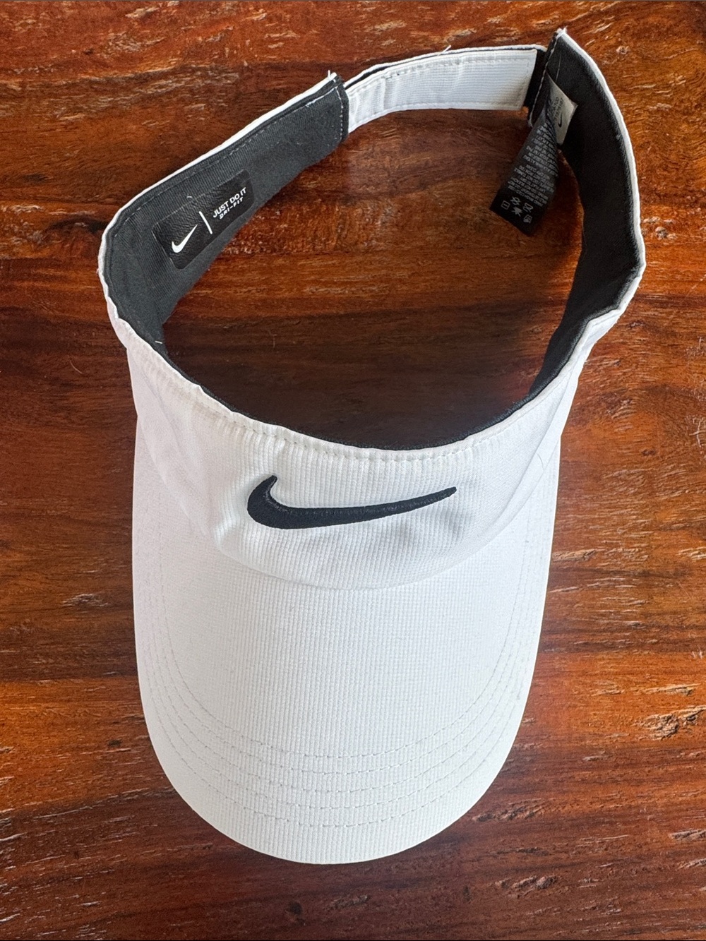 Nike White Visor with Black Swoosh Logo